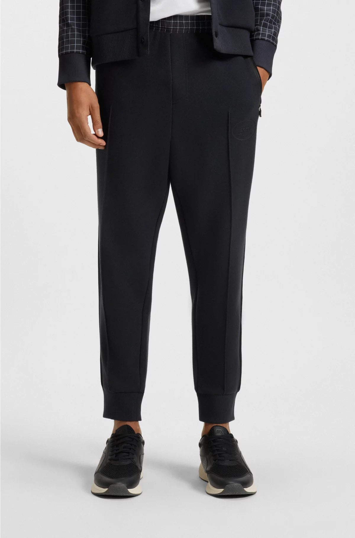 CHECK-PRINT TRACKSUIT BOTTOMS IN STRETCH PIQUE