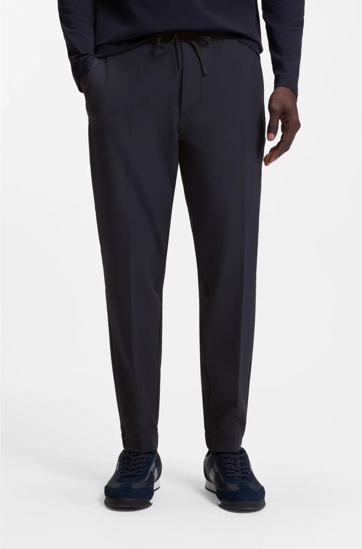 TAPERED-FIT TROUSERS IN WATER-REPELLENT STRETCH FABRIC