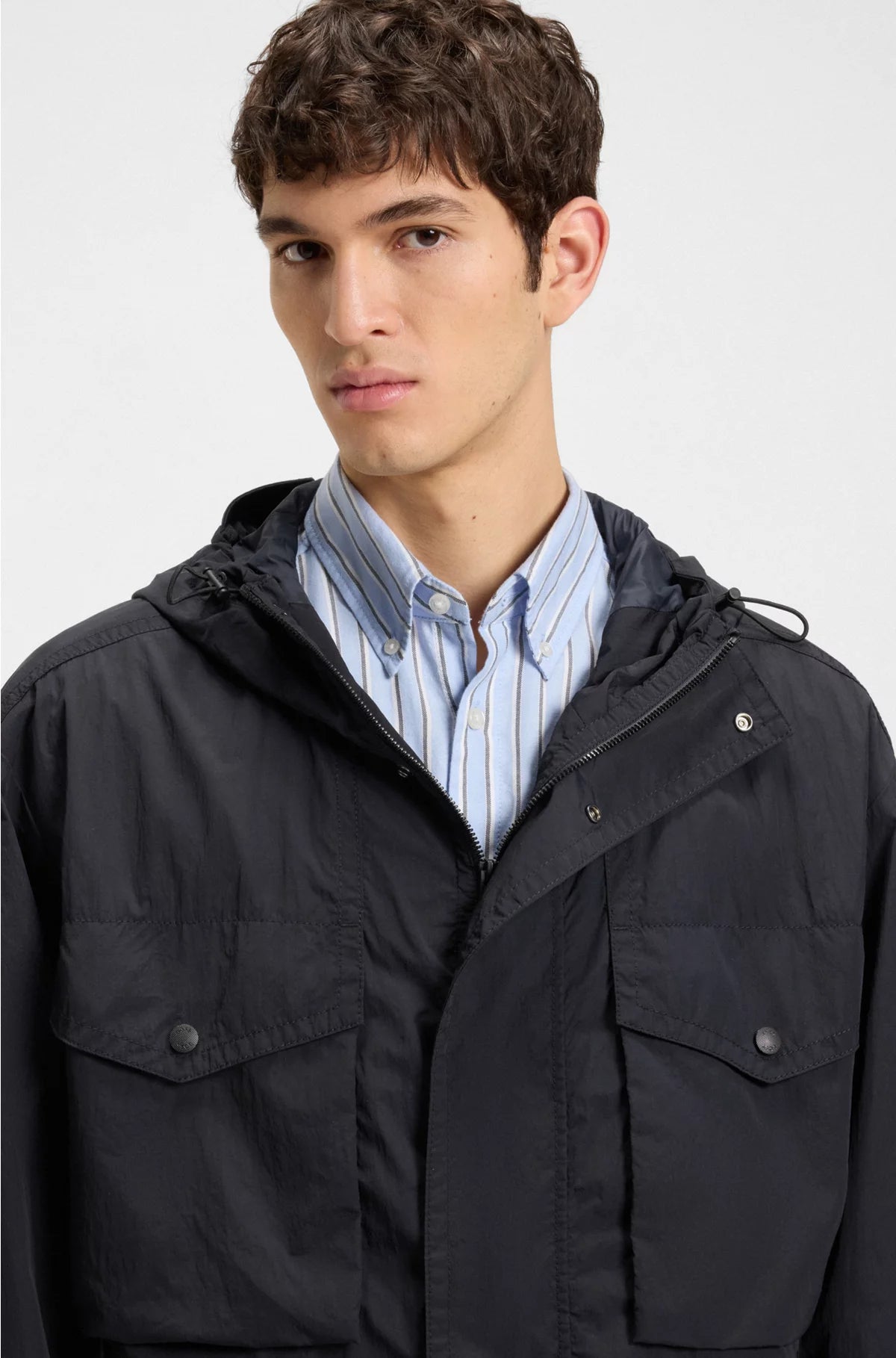 WATER-REPELLENT JACKET WITH HOOD VISOR