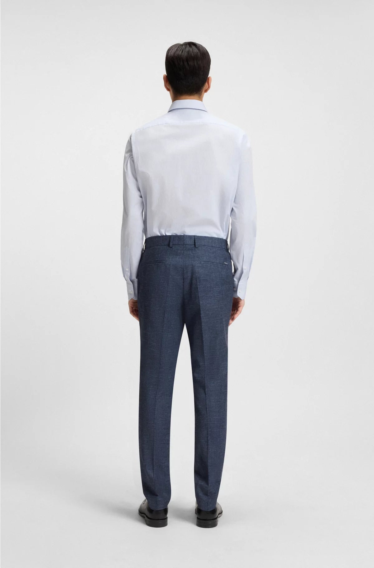 SLIM-FIT TROUSERS IN PATTERNED STRETCH FABRIC